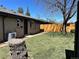 Spacious backyard featuring a newly installed fence and healthy green lawn at 2804 N Harrison St, Denver, CO 80205