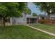 Backyard of a home with a covered patio and a grassy area at 3256 S Ogden St, Englewood, CO 80113
