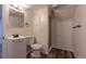 This bathroom has a modern vanity, toilet and a shower with a glass door at 3256 S Ogden St, Englewood, CO 80113