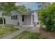 Inviting single-story home entrance featuring a covered porch at 3256 S Ogden St, Englewood, CO 80113