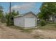 Detached garage, white door at 3256 S Ogden St, Englewood, CO 80113