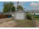 Detached garage, white door at 3256 S Ogden St, Englewood, CO 80113