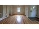 Bright living room showcasing hardwood floors and ample natural light at 3256 S Ogden St, Englewood, CO 80113