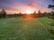 Sunset aerial view of open field at 121 County Road 146, Elizabeth, CO 80107
