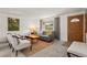 Bright and inviting living room with modern decor and a large window at 6114 Miller St, Arvada, CO 80004