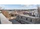 Urban street view with historic building and mountain backdrop on a sunny day at 2330 Eliot St # 2, Denver, CO 80211