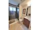 Updated bathroom with stylish vanity, sleek shower with glass doors, and modern fixtures at 315 E 112Th Dr, Northglenn, CO 80233