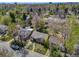 Charming single-story home with mature trees and a well-manicured front yard in a suburban neighborhood at 600 E Amherst Ave, Englewood, CO 80113