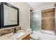 Bathroom featuring a granite vanity, glass-enclosed shower, and stylish fixtures at 2791 S Bahama Ct, Aurora, CO 80013