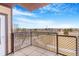 Relax on your balcony and enjoy the views of the community on a clear, sunny day at 15475 Andrews Dr # 310, Denver, CO 80239
