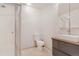 Modern bathroom with sleek vanity, square sink, a tiled shower, and modern fixtures at 15475 Andrews Dr # 310, Denver, CO 80239