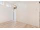 Minimalist bedroom featuring a colorful stained-glass feature above the interior door at 15475 Andrews Dr # 310, Denver, CO 80239