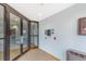 Building lobby with elevators, and building directory, all accessible through secure glass doors at 15475 Andrews Dr # 310, Denver, CO 80239
