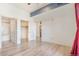 Spacious bedroom with light-colored flooring, offering ample natural light and closet space at 15475 Andrews Dr # 310, Denver, CO 80239