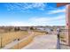 Scenic view from balcony overlooking a community park, lake and surrounding neighborhood at 15475 Andrews Dr # 310, Denver, CO 80239