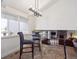 Cozy breakfast nook with views of the living room fireplace at 9667 W Ohio Ave, Lakewood, CO 80226