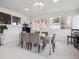 Sun-filled dining room with views of the exterior at 9667 W Ohio Ave, Lakewood, CO 80226