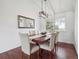 Formal dining room with a large window overlooking the backyard at 9667 W Ohio Ave, Lakewood, CO 80226