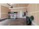 Spacious garage interior with storage shelves and ample room for vehicles at 20801 Randolph Pl, Denver, CO 80249