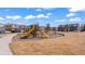 Community playground with slides and swings in a well-maintained neighborhood at 20801 Randolph Pl, Denver, CO 80249