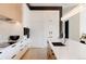 Modern kitchen with sleek cabinetry, high-end appliances, and a spacious island at 1901 Wazee St # 1401, Denver, CO 80202