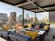 Spacious rooftop terrace with city views and fire pit at 1901 Wazee St # 1401, Denver, CO 80202