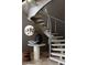 Contemporary metal staircase with light wood steps and stylish decor at 1901 Wazee St # 1401, Denver, CO 80202