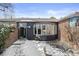 Charming home with a brick exterior, bay window and landscaped front entrance at 2717 S Steele St, Denver, CO 80210