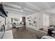 Cozy living room featuring a fireplace, built-in shelving, and comfortable seating at 2717 S Steele St, Denver, CO 80210