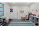 Bright playroom with toys, storage, and a striped rug for a fun atmosphere at 2717 S Steele St, Denver, CO 80210