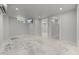 Large bedroom with bright neutral colors and sleek floors, flooded with natural light from windows, creating a serene retreat at 2577 Depew St, Edgewater, CO 80214