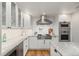 Well-equipped kitchen features stainless steel appliances, ample counter space, and modern cabinetry at 2577 Depew St, Edgewater, CO 80214
