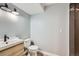 This bathroom features modern fixtures, a stylish vanity, and a sleek shower with tiled accents at 3938 Lazy K Dr, Castle Rock, CO 80104