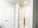 Bathroom with a glass-enclosed shower and a toilet room separated by a door at 19221 E 65Th Ave, Denver, CO 80249