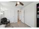 Clean bedroom with closet and view into hallway at 19221 E 65Th Ave, Denver, CO 80249