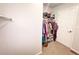 Walk-in closet with organized storage, including shelves and hanging rods for ample clothing and accessories at 19221 E 65Th Ave, Denver, CO 80249