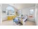 Bright bedroom with vaulted ceilings, large window, and tasteful decor at 6414 E Stanford Ave, Cherry Hills Village, CO 80111