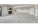 Finished basement with stone fireplace, carpet, and neutral walls, perfect for a Gathering room at 1740 Joseph Cir, Elizabeth, CO 80107