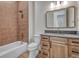 Well-appointed bathroom featuring a tub-shower combo, granite counters, and a modern vanity at 1740 Joseph Cir, Elizabeth, CO 80107