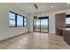 Dining area with sliding glass doors leading to a deck, offering expansive views of the surrounding landscape at 1740 Joseph Cir, Elizabeth, CO 80107