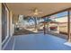 Covered backyard patio featuring a ceiling fan and pergola with outdoor seating at 2955 E Caley Ave, Centennial, CO 80121
