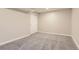 Finished basement area with neutral carpet and closet for storage at 2955 E Caley Ave, Centennial, CO 80121