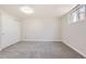 Bright bedroom with neutral carpet, white trim, and a closet with sliding doors at 2955 E Caley Ave, Centennial, CO 80121