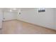 Large basement area features tile flooring, windows, and plenty of open space at 12501 Randolph Pl, Denver, CO 80239
