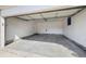 Spacious two-car garage with ample room for parking and storage at 12501 Randolph Pl, Denver, CO 80239