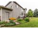 A house's backyard features a patio area with a grill and dining table at 5473 W Prentice Ct, Littleton, CO 80123