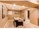 Basement with air hockey table and comfortable recreation space at 5473 W Prentice Ct, Littleton, CO 80123