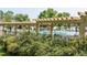 Community pool area featuring a large pool, deck chairs, and cabanas at 5473 W Prentice Ct, Littleton, CO 80123