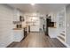 Bright kitchen with stainless appliances, butcher block counters and wood floors at 2980 S Parker Ct, Aurora, CO 80014