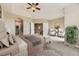 Main bedroom with a ceiling fan and carpeted floors at 10311 Belvedere Ln, Lone Tree, CO 80124